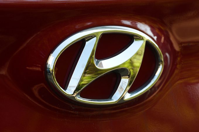 Hyundai Logo seen on a red car