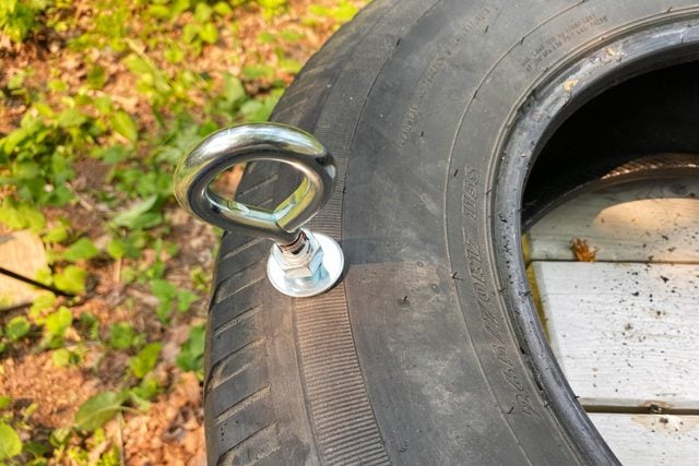 installing eye hooks to a tire for a tire swing