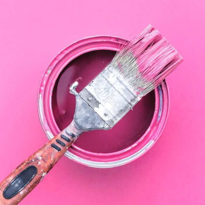 Barbie Pink Paint can and paintbrush o na pink background
