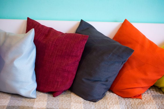 pillows in multiple different colors that don't match