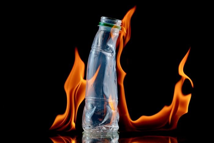 Burning Plastic water bottle On Fire