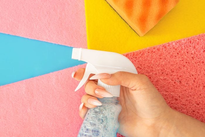 Cleaning Spray Bottle And Colored Rags, House Cleaning Concept