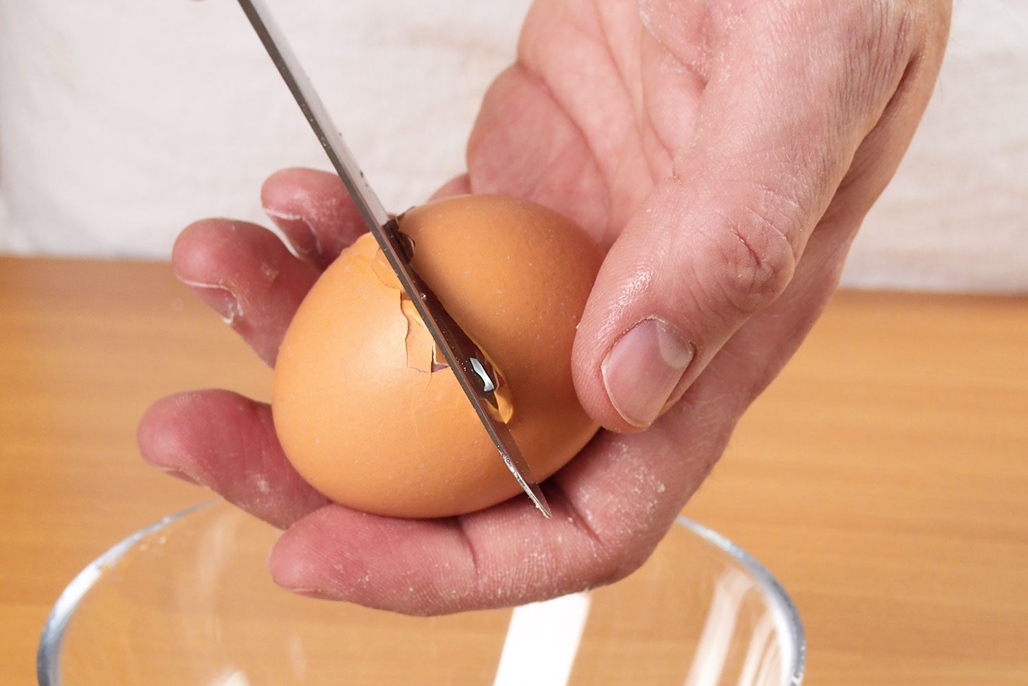 Crack Egg Into Bowl to Make Apple Pie Tarts