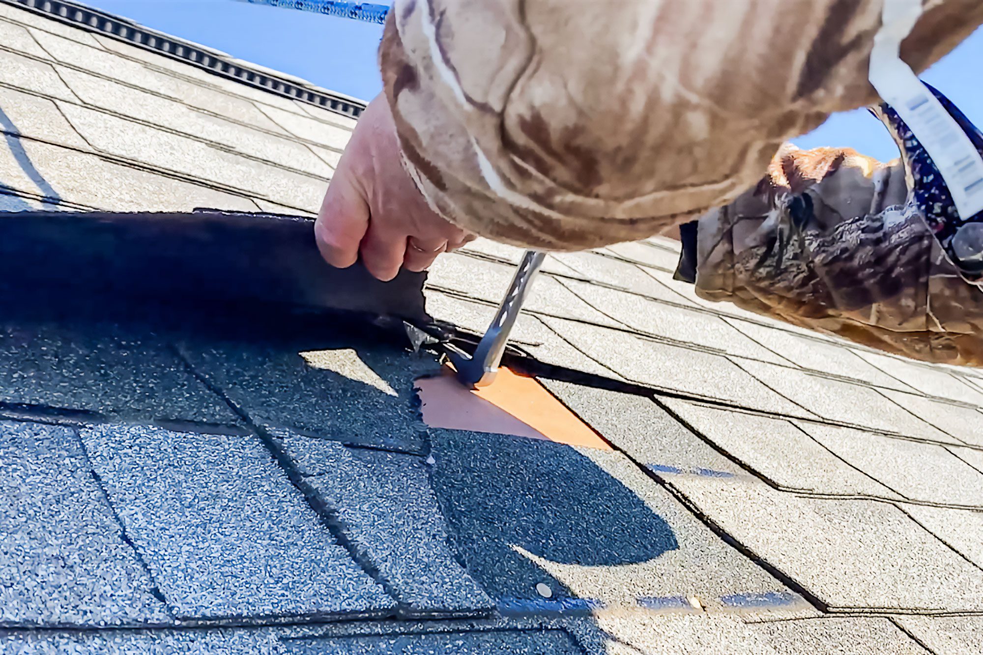 How To Replace Damaged Shingles, Prying out the roofing nails