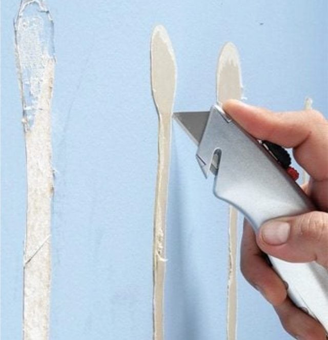 Cut Glue Strips On Wall