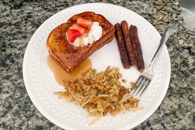 Breakfast made on Loco Smarttemp Griddle served in a white plate with fork