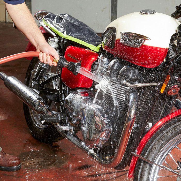 Cleaning Motorcycle with Water 