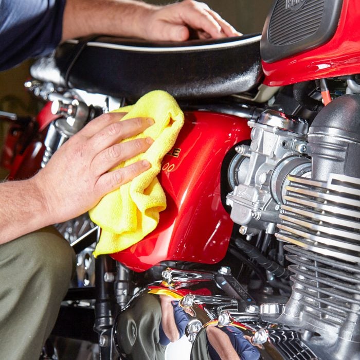Polishing Motorcycle with Cloth