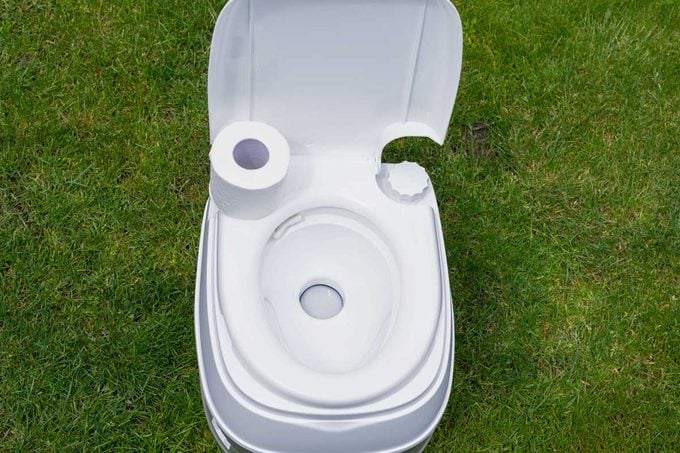 Overhead of Bio Portable Camping Toilet outdoors in a green grass area