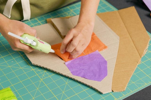 Glue the tissue paper to the cardboard