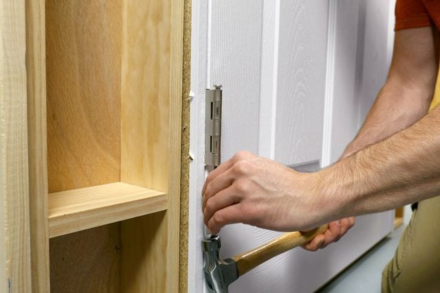 Removing the hinge pins of a Door