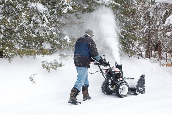 Man with snowblower