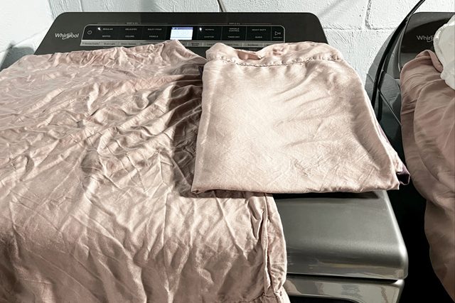 Wrinkled pillow sheets on a washing maching